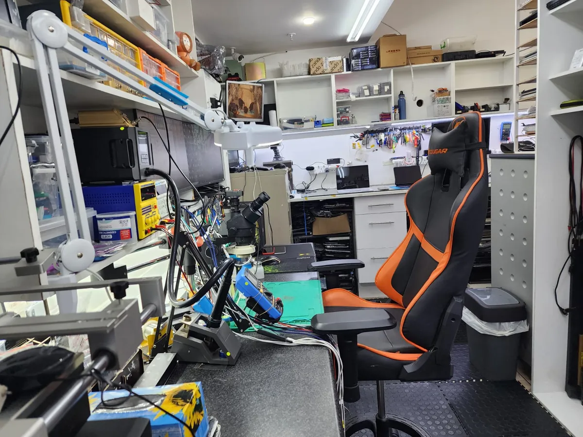 PC Vitamins repair workshop interior showing workstations and equipment